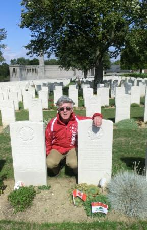 CIMG8335 Sep 5 2017 Pieter by grave of Cpl Kenneth Bell in Vis en Artois British Cemetery