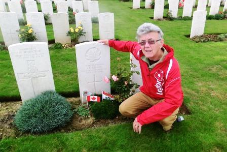 CIMG8494 Sep 6 2017 Pieter by the grave of James A Cairns in Bac Du Sud British cemetery