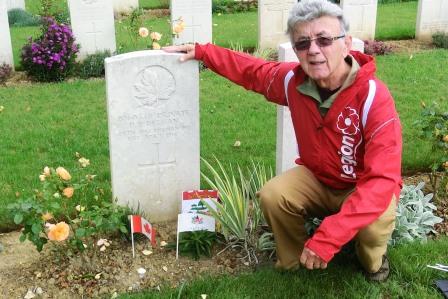 CIMG8507 Sep 6 2017 Pieter by grave of Patrick Deegan at Bellacourt Military Cemetery