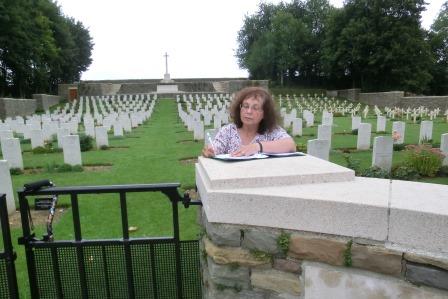 CIMG8517 Sep 6 2017 Daria writes in the guest register at Bellacourt Military Cemetery