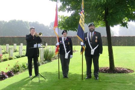 CIMG8948 Sep 15 2017 Groesbeek cemetery bugler with Yvonne and Berry Swarthoff providing colour parade